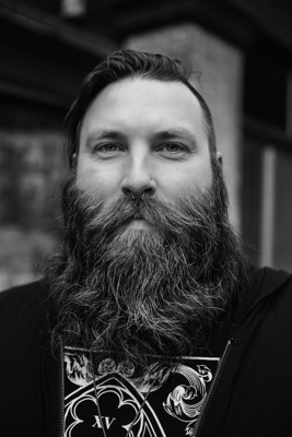 Greyscale picture of Casey Dunham, the website author.